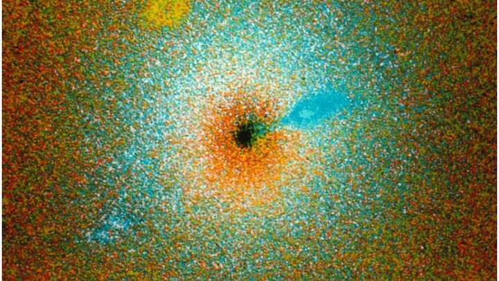 -106352981-optical-photo-of-galaxy-m87-showing-jet-spl