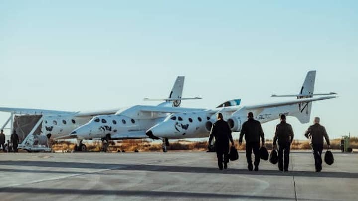 106810701-1607952051360-virgin-galactic-pilots-on-their-way-to-the-virgin-galactic-spaceflight-syste