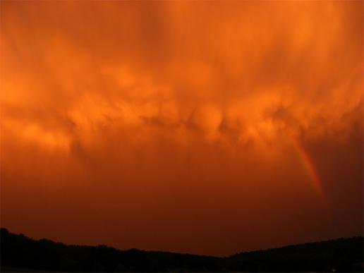 2011-09-crmb-Regenbogen bei Sonnenuntergang und Gewitterwolke u00fcber Odenwald