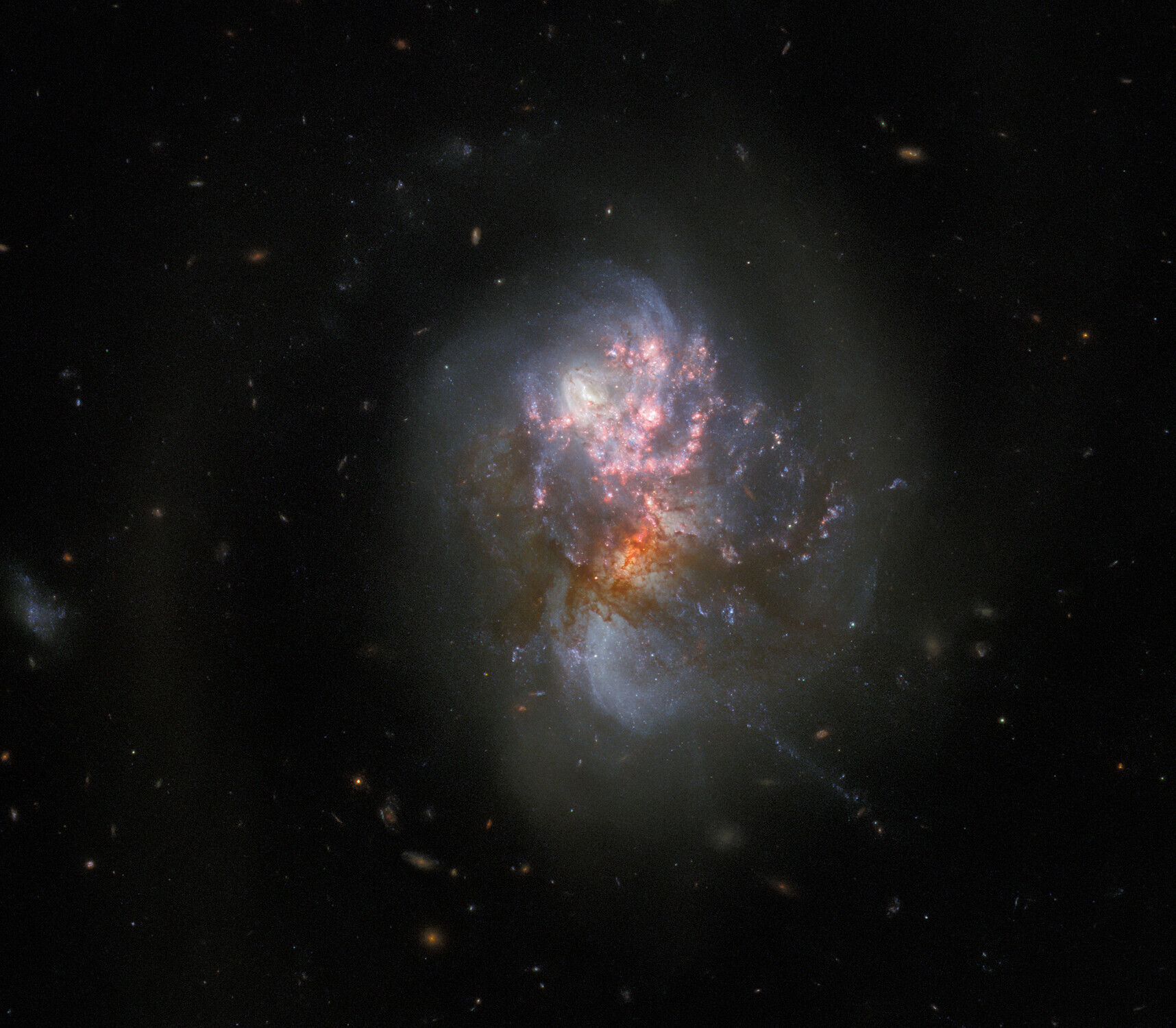 hubble-explores-a-pair-of-merging-galaxies