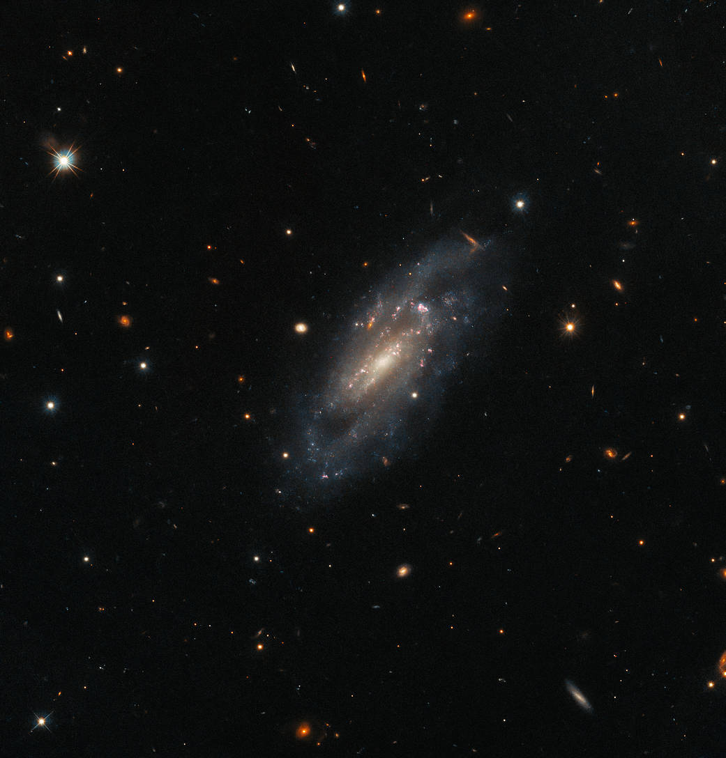 hubble-ugc11860-potw2327a