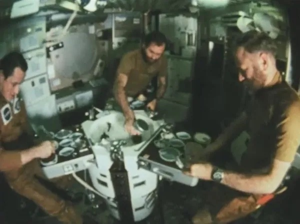 skylab-4-launch-20-all-three-at-a-meal-from-video-8540