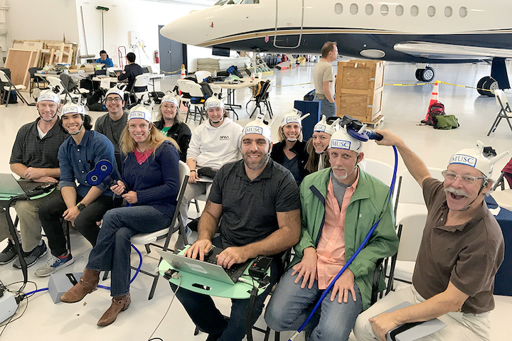 zero-gravity-team-in-hangar